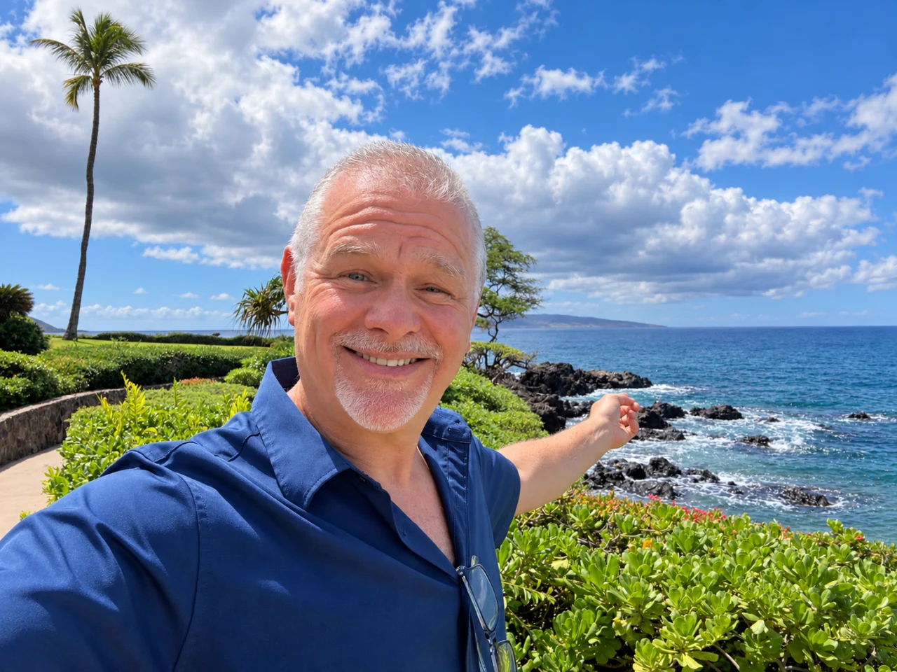 Mark McIntyre in a blue shirt beside the North County San Diego coast